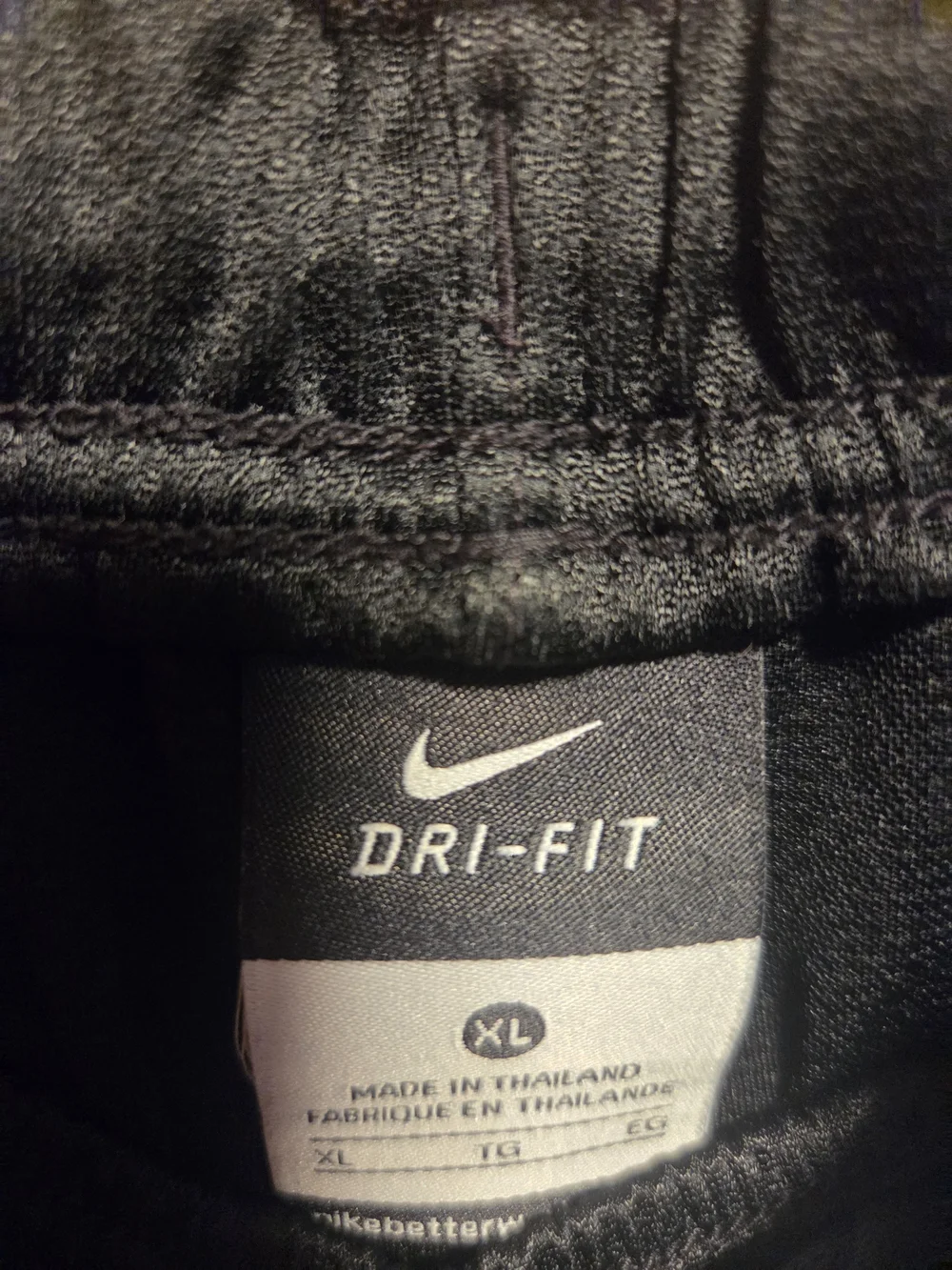 Nike Boys Black Shorts with Purple and Neon Yellow Accents